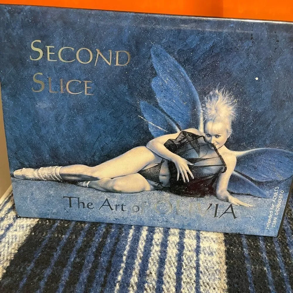 Second Slice The Art of Olivia Hardback Book